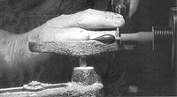 The flame finial is turned seperatly