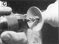 With a 3/8" drill bit, drill the final depth of the bell.